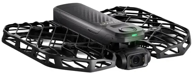 Svart HoverAir drönare med fyra propellrar och integrerad kamera i modern design