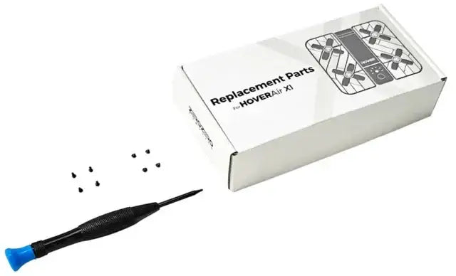 Reparationskit med reservdelar och verktyg för HOVERAir X1 drönare i vit förpackning